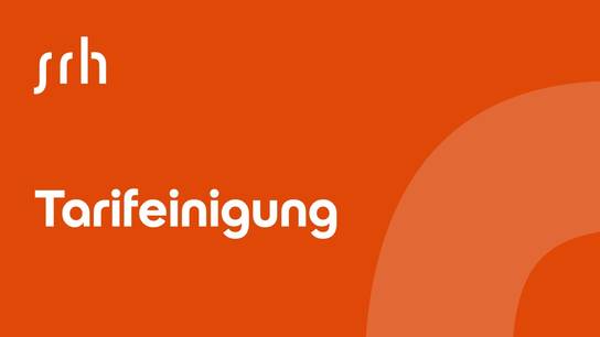 Weiße Schrift "Tarifeinigung" auf orangenem Untergrund; Bild zur Pressemitteilung: Einigung bei Tarifverhandlungen